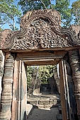 Banteay Srei temple - ancillary building of the causeway, Vishnou in the form of Narasimha holds upside-down Hiranya-Kasipu, the king of the Asuras